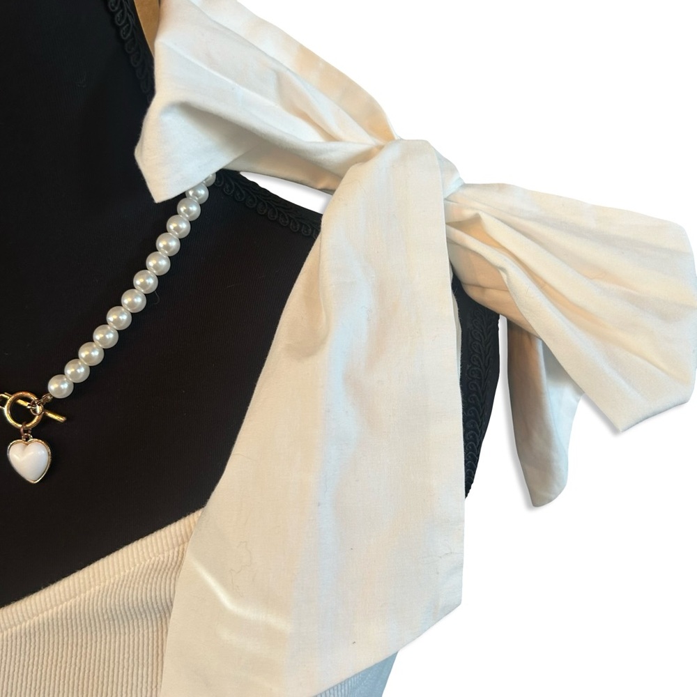 🕊 Vigoss One-Shoulder Bow Top
Size: Small
Color: Cream / White - Picture 3 of 6